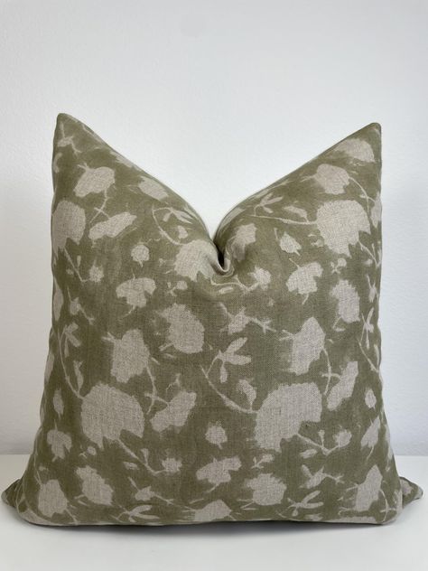 PRICES MAY VARY. 100% Linen Our Sage pillow cover features a creamy-beige floral pattern on a sage-green background on super soft linen. All our pillows are handmade with intricate hand block printing on 100% organic linen front and 100% organic cotton duck-canvas reverse. Inserts not included; recommend going up 2" for a full look (eg, 20x20 cover fits a 22x22 insert perfectly). DRY CLEAN only; iron at medium setting if necessary. Slight variations and small imperfections that comes with handma Forest Green Pillows Living Rooms, Beige Couch Green Pillows, King Bed Decorative Pillows, Printed Pillow Covers, Studio Mcgee Pillow Combinations, Throw Pillows Beige Couch, Soft Autumn Home Decor, King Bed Throw Pillows, Pillow Combinations For Bed