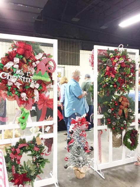 Wreaths are a great way to add some festive flair to your home. But what if you're hosting a craft show? This quick guide will give you my top wreath display ideas, plus tips for drawing in buyers at the craft fair! Wreath Display For Craft Show, Display For Craft Show, Wreath Display, Craft Fair Booth Display, Christmas Booth, Craft Show Booths, Craft Show Booth, Indoor Crafts, Wreath Storage