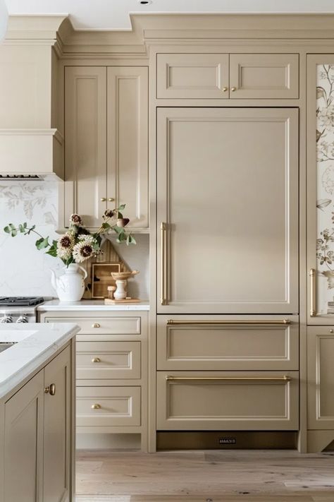 60+ Cozy Beige Kitchen Cabinet Color Ideas Ivory Painted Kitchen Cabinets, Cream Kitchen Cabinets With Gold Hardware, Sand Colored Cabinets, Light Taupe Cabinets Kitchen, Sherwin Williams Tan Cabinet Colors, Light Airy Kitchen Ideas, Agreeable Beige Kitchen Cabinets, Tan Kitchen Island, Kitchen Cream Color