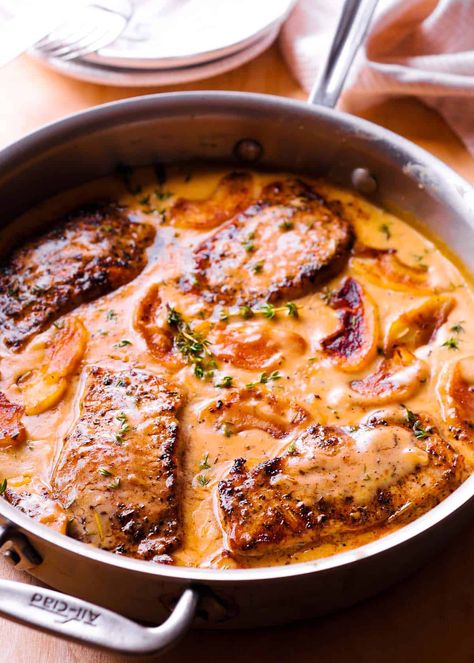 Pork Chops with Apples and Cider Pork Chops With Apples And Bacon Food And Wine, Pork And Applesauce Recipes, Pork Chop Brine Recipes Apple Cider, Cider Braised Pork Chops, Apple Cider Pork Crock Pot, Apple Gravy For Pork, Pork Chops Apple Cider, Pork Chops Cherry Tomatoes, Apple Pork Roast Recipes