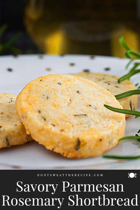 Fresh rosemary, parmesan cheese, and loads of fresh cracked black pepper make this savory Parmesan Rosemary Shortbread the perfect cocktail appetizer or snack. #holidays #recipe #coctails #cookies Rosemary Parmesan Shortbread, Rosemary Cheese Crackers, Rosemary Parmesan Crackers, Parmesan Cheese Appetizers, Savory Christmas Baked Goods, Parmesan Cookies Recipe, Savory Shortbread Crackers, Parmesan Shortbread Cookies, Savory Cheese Cookies