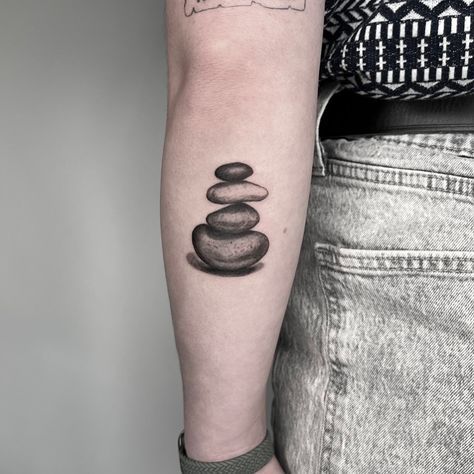 Enjoyed doing another rock stack tattoo the other day. Thanks @kaemorg 😊 #tattoo #flashtattoo #microrealism #blackandgreyrealism #minimaltattoo #denvertattoo #art #tattoos #realism #naturetattoo #cairn #rockstacks #denvertattooartist #blackandgreytattoo Ebenezer Stone Tattoo, Balancing Rocks Tattoo, Stacked Rocks Tattoo, Rock Stack Tattoo, Rock Cairn Tattoo, Cairns Tattoo, Rock Tattoo Nature, Cairn Tattoo, Rock Tattoo Ideas