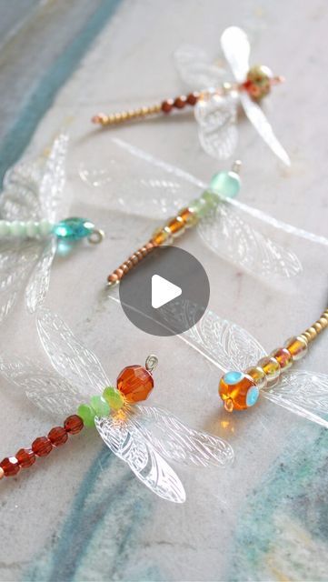 Tanya | Decor, DIY & Thrifting on Instagram: "If you loved my beaded spiders, you’ll love this: how to make a DIY beaded dragonfly!⁣ ⁣ I used my new (#gifted) @cricut Maker 3 to quickly and easily create these intricate and ethereal dragonfly wings. Then I simply threaded beads and the wings onto 16 gauge wire to make these pretty beaded ⁣dragonflies.⁣ ⁣ Hang these in a window, string them onto a garland, or add them to a pretty spring or summer wreath!⁣ ⁣ Check out my other videos for more beaded craft tutorials, beading ideas, Cricut projects ideas, Cricut crafts, and spring DIY décor.⁣ ⁣ (P.S. detailed tutorial and supply list is on the blog today!)⁣ ⁣ #cricutmade #cricutcrafts #dragonfly #dragonflylove #dragonflyart ⁣ #beadedornament #diyornament⁣ ⁣ Music from #Uppbeat (free for Creato Cricut Projects Ideas, Beaded Dragonflies, Diy Dragonfly, Glass Bead Crafts Diy, Dragon Fly Craft, Cricut Maker 3, Beaded Dragonfly, Beaded Spiders, Dragonfly Wings