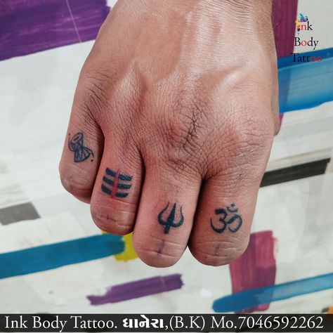 mahadev tattoo 7046592262 for any inq . 🕉️✨ #Mahadev #Shiva #FingerTattoo #DivineEnergy #Spirituality #InkInspiration" Om Tattoo Small, Mahadev Tattoos, Tattoo Mahadev, Trishul Tattoo Designs, Mahadev Tattoo, Mahadev Shiva, Om Tattoo Design, Shiva Tattoo Design, Om Tattoo