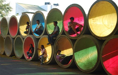 Storm water pipes with colored cellophane. #urban #guerrilla Color Architecture, Storm Water, Urban Playground, Urban Intervention, Appartment Decor, Public Space Design, Eco Architecture, Permaculture Design, Playground Design