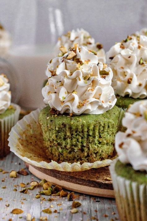 Made from scratch with 100% real pistachios, these soft and fluffy pistachio cupcakes are full of warm pistachio flavor. Topped with the most incredible whipped cream cheese frosting, they are the perfect cupcake treat. Bonus: the recipe can be made gluten-free, dairy-free, vegan, or plain regular. Pistachio Cupcakes, Whipped Cream Cheese Frosting, Pistachio Cream, Individual Cakes, Whipped Cream Cheese, Dairy Free Options, Made From Scratch, Ice Cream Cake, Cheese Frosting