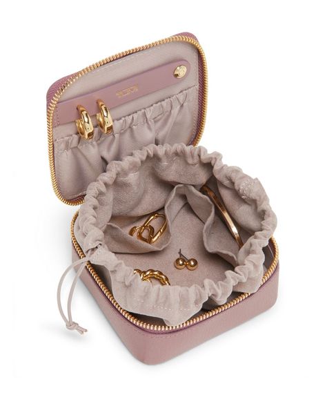 This luxe leather jewelry case is designed to organize earrings, necklaces and rings when traveling or on-the-go. With the option of complimentary monogramming, it makes the perfect gift. Organize Earrings, Jewelry Travel Case, Necklaces And Rings, Lily Chee, Travel Jewelry Organizer, Earring Organizer, Travel Products, Travel Jewelry Case, Travel Jewelry