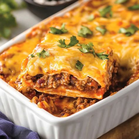 Beef Enchilada Bake Recipe - emiliarecipes.com Beef Enchilada Casserole Flour Tortillas, Baked Enchiladas Beef, Enchilada Bake Beef, Beef Enchilada Bake, Baked Enchiladas, Ground Beef Beans, Enchiladas Beef, Beef Enchilada Casserole, Veggie Enchiladas