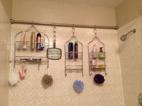 Install a tension rod in your shower and hang multiple shower caddies for additional storage. Makeover Kamar Mandi, Rv Bathroom, Bathroom Hacks, Bathroom Storage Solutions, Shower Organization, Ideas Para Organizar, Downstairs Bathroom, Shower Rod, Creative Storage