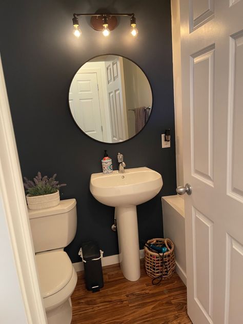 Hale Navy Bathroom Walls, Navy Paint Bathroom, Navy Blue Accent Wall Bathroom, Hale Navy Bathroom, Navy Powder Room, Black Fixtures Bathroom, Navy Paint Colors, Navy Accent Walls, Navy Bathroom