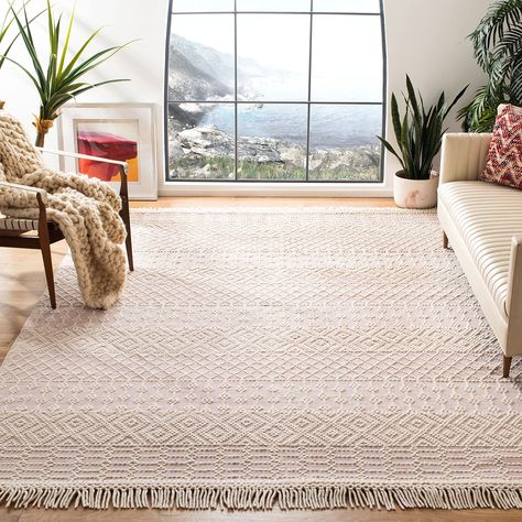 PRICES MAY VARY. Transitionally designed, these rugs can be integrated into any contemporary, modern, traditional, or bohemian styles of décor Meticulously detailed artisan crafted hand-woven construction Made from plush premium wool fibers Comfortable 0.4-inch pile height provides cushioned softness underfoot SAFAVIEH has been a trusted brand and leader in home furnishings for over 100 years, using their expertise in crafting trendy high-quality designs; Begin your rug search with SAFAVIEH and Mosaic Texture, Fringe Rugs, Moroccan Boho, Southwestern Rug, Flatweave Area Rug, Beach House Style, Pink Area Rug, Ivory Rug, Online Home Decor Stores