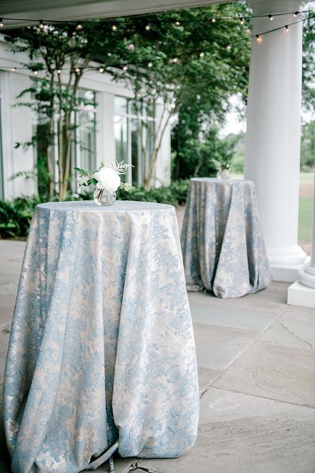 Blue Floral Linen Wedding, Blue Patterned Tablecloth Wedding, Dusty Blue Cocktail Table, Blue And White Cocktail Table, Blue Green Silver Wedding, Wedding Reception Blue Theme, Banquet Room Wedding Reception Ideas, Navy Green And White Wedding, Blue And Green Wedding Reception