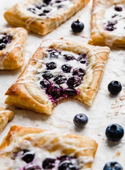 You can make a Blueberry Danish with a flaky puff pastry dough topped with a cream cheese mixture and fresh blueberries in just 20 minutes! It’s so easy, simply and delicious! Blueberry Danish Recipe, Blueberry Dinner, Danish Recipe Puff Pastry, Blueberry Danish, Danish Recipe, Cream Cheese Danish, Puff Pastry Dough, Blueberry Cream Cheese, Easy Blueberry