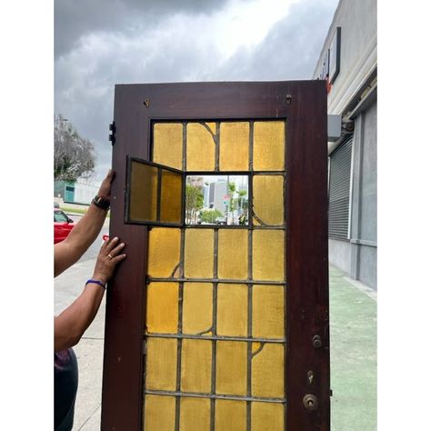 Authentic Spanish Revival Leaded Glass Stained Glass Door - Timeless Elegance with Amber Colored Glass, Original Hardware, and Raw Wood Finish  Transform your home into a Spanish Revival masterpiece with this magnificent leaded glass stained glass door. Crafted with meticulous attention to detail, this door captures the essence of Spanish Revival architecture, featuring amber colored glass, original hardware, and a Raw wood finish. Elevate the aesthetics of your space and immerse yourself in a w Wooden Stained Glass Front Door, Teak Door Frame Design, Painted Door With Stained Wood Trim, Round Window Exterior, Spanish Door Design, Antique Wood Door, Unique Bathroom Door Ideas, Stained Glass Doors Entrance, Mcm Cabin