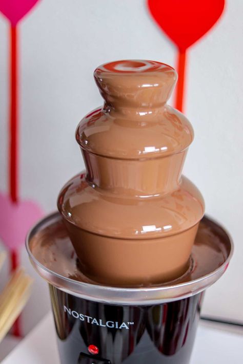 Chocolate fountains are the best part of a party. Set up a chocolare bar to be the focus of your gathering Chocolate Fountain Recipe, Chocolate Fountain Bar, Chocolate Fountain Recipes, Chocolate Fountain, Willy Wonka, Valentine's Day, Bar, Quick Saves