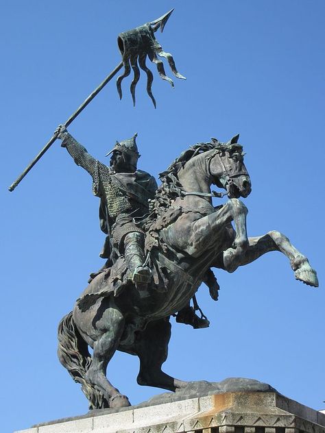 William the Conqueror statue at Falaise, France. Monument to William the Conqueror at Falaise (Calvados, Basse-Normandie). The equestrian statue of the seventh Duke of Normandy, sculpted by Louis Rochet (1818-1873), was built in 1851. On the pedestal, statues representing the preceding six dukes were added in 1875. Man vyi - own photo http://en.wikipedia.org/wiki/William_the_Conqueror Modern Statue, Norman Conquest, Equestrian Statue, William The Conqueror, Queen Of England, British Monarchy, Horse Sculpture, 11th Century, British History