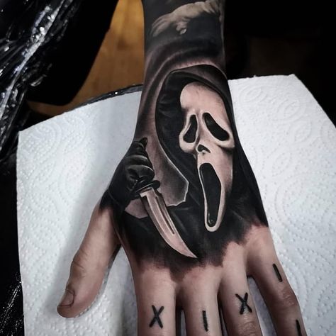 Ghost Face Finger Tattoo, Horror Movie Hand Tattoos, Face Hand Tattoos For Guys, Scream Hand Tattoo, Ghost Face Hand Tattoo, Ghost Face Tattoo Small, Horror Hand Tattoos, Django Tattoo, Slasher Tattoo