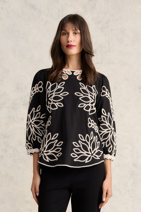 Offering a touch of understated glamour, our lightweight Embroidered Cotton Blouse is crafted from cotton voile and features beautiful floral-inspired placement embroidery in Ecru. With cut out panels and button back fastening, this shirt creates a sleek look with a black pant or paired with our Embroidered Cotton Skirt. Placement Print Dress, Cod Set, Cord Embroidery, Placement Embroidery, Cotton Jackets Women, Understated Glamour, Placement Print, Fancy Kurti, Summer 2025