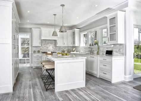 Gray floors certainly are not something you see every day - especially in kitchens. Unfortunately, the color gray is often associated with feelings of sadn Luxury White Kitchen Design, Grey Wood Floors Kitchen, Luxury White Kitchen, Kitchen With White Cabinets, Beautiful White Kitchens, Grey Kitchen Floor, Серая Кухня, Grey Wood Floors, Wood Floor Kitchen