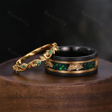 Here we have a Vintage Emerald Couples Band Yellow Gold Matching Ring Set His and Hers Wedding Band Mens Green Opal Ring Anniversary Gift For Men For Women ITEM DESCRIPTION ✦ Handmade, high-quality item! ✦ Material: Sterling Silver/Tungsten ►Sold as a two-piece set ►His ring is Yellow Gold and Black Tungsten Carbide with opal and 24k gold leaf inlay. ►His band width: 8mm ►His tungsten ring will not turn green itself and will not cause your skin to turn green.  ✦ Durable - Incredibly Scratch-Resi Men Rings Gold Wedding, Black And Green Wedding Band, Mens Engament Rings, Wedding Bands For Groom, Witchy Wedding Rings Men, Vintage Men Wedding Ring, Men’s Wedding Bands With Emerald, Mens Rings Engagement, Forest Green Engagement Ring