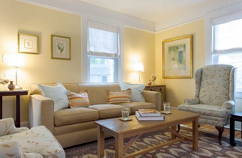 Delicate and soft honeyed yellow gives the room a charming, warm glow Grey And Yellow Living Room, Boston Living Room, Tan Living Room, Yellow Decor Living Room, Yellow Living Room, Room Color Schemes, Brown Living Room, Yellow Walls, Living Room Remodel