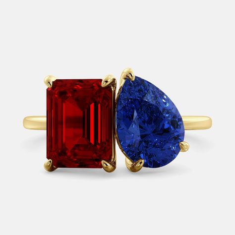 A toi et moi ring with an emerald-cut ruby and a pear-cut gemstone. The emerald-cut morganite is set on the left of the ring Red And Blue Engagement Ring, Ruby Sapphire Ring, Sapphire And Ruby Ring, Capricorn Ring, Taurus Ring, Gemini Ring, Diamond Band Engagement Ring, Zodiac Rings, Diamond Heart Ring