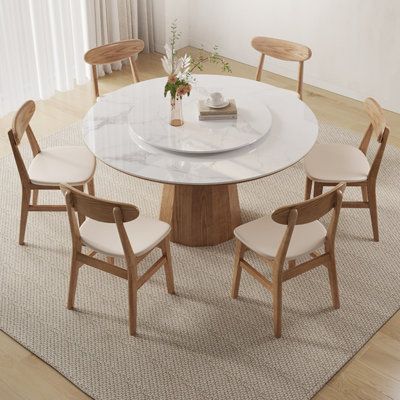 Features:Number of Items Included: 7Table: YesNumber of People Set Accommodates: 6Chairs: YesNumber of Chairs Included: 6Arms Included: NoBench Seating: NoUpholstered Bench: Number of Benches Included: Leaf Storage Type: Fixed TableTable Top Shape: RoundSeat Back Included: YesLeaf Included: NoNumber of Leaves: Sideboard Included: NoTable Base Material: Solid WoodBase Material Details: Base Wood Species: Seat Material: Solid WoodSeating Wood Species: Upholstery Material: Faux leatherNatural Varia Ash Wood Table, Marble Top Dining Table, Round Kitchen Table, Round Wood Dining Table, Round Dining Set, Living Room Design Inspiration, Kitchen Dining Sets, Round Rock, Cafe Tables