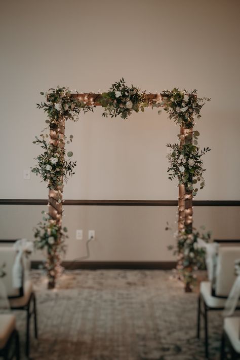 Wooden wedding altar wrapped in fairy lights and adorned with floral greenery for this ballroom wedding at The Edwin Hotel in Chattanooga, Tennessee   #taylorenglishphotography #hotelwedding #ballroomwedding #weddingaltar #twinklelights #mayflowerschattanooga #chattanoogawedding Modern Retro Decor, English Photography, Wedding Altar, Chattanooga Wedding, Twinkly Lights, Okay Okay, Floral Greenery, Wedding Altars, Rainy Wedding