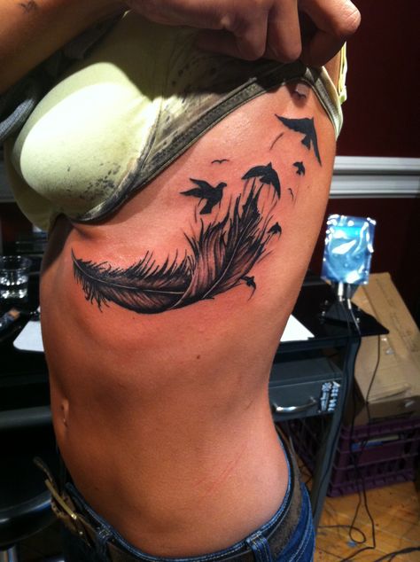 Cover Up Tattoos Underboob, Leaf Tattoo Under Breast, Feather Into Birds Tattoo, Feather Tattoos Underboob, Underboob Cover Up Tattoo, Rib Tattoos For Women Cover Up, Feather Back Tattoo, Feather Underboob Tattoo, Underboob Tattoo Coverup