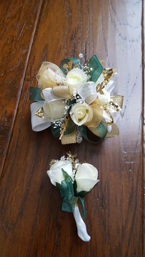 Emerald green and gold corsage set from Hen House Designs www.henhousedesigns.net Corsage And Boutonniere Set Green, Jade Green Corsage, Green And Gold Corsage Prom, Green Prom Corsage And Boutonniere, Emerald Green And Gold Corsage, Prom Corsage And Boutonniere Emerald Green, Prom Flowers Corsage Green Dress, Emerald Green Bouquet Prom, Green And Gold Boutonniere