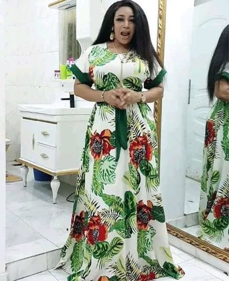 Ankara English Gown Styles, Chivonne Dress Styles, Flowered Crepe Gown Styles, Flower Materials Styles For Ladies, Style For Vintage Material Gowns, Long Crepe Gown Styles, Flower Material Styles For Ladies, Crepe Long Gown Style In Nigeria, Vintage Material Gown Styles For Ladies