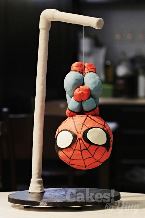 Spider Man Biscuit, Marvel Crafts, Comic Cake, Hanging Spider, Spider Man Cake, Spiderman Gifts, Gravity Defying Cake, Man Cake, Spiderman Cake