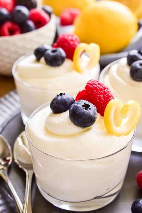 This easy Lemon Mousse is the perfect way to welcome spring! Light, fluffy mouse infused with the sweet flavor of lemon...this sweet treat is delicious all on its own or topped with fresh berries. Whether you're looking for a last minute Easter dessert or the perfect dessert for spring showers, this 5-ingredient Lemon Mousse is sure to be a hit! Desserts With Fruit, Lemon Tree Dwelling, Mothers Day Desserts, Dessert Parfait, Lemon Mousse, Cheesecake Mousse, Spring Showers, Spring Light, Rich Desserts