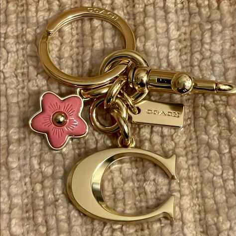 Nwt Coach Signature "C" Bag Charm Plated Brass & Resin Keychain/ Key Fob / Bag Charm. Brand New & 100% Authentic! Style: #. Color: Im / Gold Brass & Rose Resin And Metal Attached Split Key Ring And Dogleash Clip Cute Girly Keychains, Cute Keychains For Car Keys And Wallet, Coach Bag Charms, Keychain Aesthetic Car Keys, Coach Bag Charm, Cute Etsy Finds, Backpack Accessories Keychain, Cute Car Keys Keychains Ideas, Bag Keychain Aesthetic