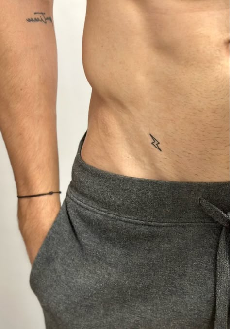 Rib Tattoos For Guys, Lightning Tattoo, Private Tattoos, Tatuagem Masculina Pequena, Small Chest Tattoos, Bauch Tattoos, Simple Tattoos For Guys, Men's Small Tattoo, Tattoo Inspiration Men