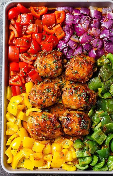 Hearty and deliciously nutritious, this sheet-pan chicken takes gourmet dinners to new levels. Dress juicy roasted chicken thighs in a spicy sweet marinade and serve with a side of sweet bell peppers and rice or bulgur. The perfect quick & easy dinner for tonight! Honey Chili Chicken, Sheet Pan Dinners Chicken, Sheet Pan Suppers, Sheet Pan Dinners Recipes, Chili Chicken, Recipe Sheets, Gourmet Dinner, Pan Recipes, Sheet Pan Dinners