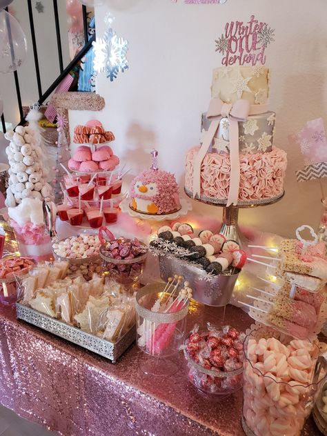 Winter ONEderland dessert table Winter Onederland Sweet Table, Winter Onederland Candy Table, Candy Onederland 1st Birthdays, Winter Onederland Snacks Food Ideas, Winter Onederland Cake Table, Winter Onederland Treat Table, Snowflake Dessert Table, Pink Winter Wonderland Dessert Table, Winter Wonderland Dessert Table Ideas