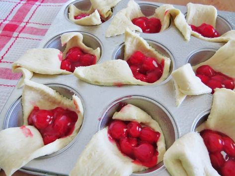 Cherry Pie Bites uses simple ingredients like cherry pie filling and crescent rolls to make a simple and tasty dessert! It's all topped with an easy iicing. Cherry Pie Bites, Mini Cherry Pies, Cherry Pies, Simple Desserts, Crescent Recipes, Pie Bites, Canned Cherries, Cherry Desserts, Crescent Roll Recipes