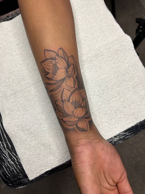 Bottom Arm Tattoo Women, 3 Lotus Flower Tattoo, Flower Tattoos Arm Forearm, Lotus Flower Tattoo On Neck, Lotus Flower Tattoo Black Women, Arm Lotus Tattoo, Inner Sleeve Tattoos For Women, Lotus Flower Forearm Tattoo, Lotus Leg Tattoo