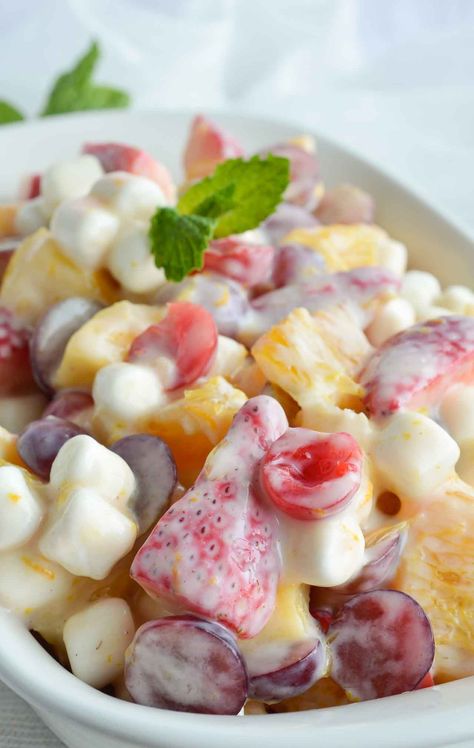 This fruit salad is made with fresh fruit, dairy free yogurt alternative and mini marshmallows. A sweet dessert treat that is healthy! Easter Fruit Salad, Ambrosia Salad Recipe, Christmas Fruit Salad, Sweet Salads, Fruit Salad With Yogurt, Fruit Salad With Marshmallows, Ambrosia Fruit Salad, Healthy Fruit Salad, Fruit Salad Recipe