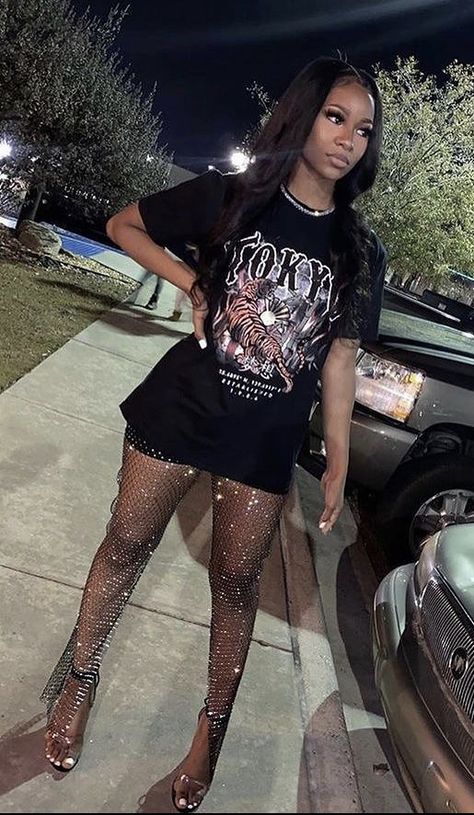 #baddieoutfit #baddiestyle #swag #girlsfashion #womenstshirts Fishnet Outfit Festival, Rhinestone Fishnet Pants Outfit, Winter Vegas Dress, Sequin T Shirt Outfit, All Black Outfit For Concert, Black And Bling Party Outfits, Rhinestone Fishnet Outfit, Club Baddie Outfits, All Black Outfit Party