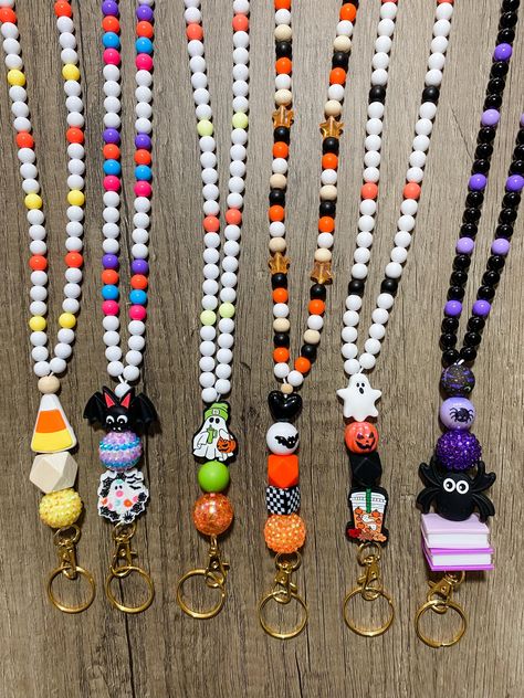 Halloween Breakaway Teacher Speech Therapist Lanyard. Halloween inspired teacher necklace lanyard with six color options. Spider, books, spooky ghost, candy corn, bat designs.  Lanyards are made of high quality beads and materials and make a perfect gift for any teacher or speech therapist!  MADE IN USA Ships from Maryland, USA This is a made to order and personalized (add on) item. Nonrefundable. Please look closely at photos in listing and item description. Message seller if you need any clari How To Make Teacher Lanyard With Beads, Beaded Halloween Necklace, Halloween Teacher Lanyard, How To Make Lanyards Diy, Things To Make With Silicone Beads, Diy Teacher Lanyard Beads, Beaded Lanyards Diy, Lanyards Diy, Teacher Lanyard Beaded