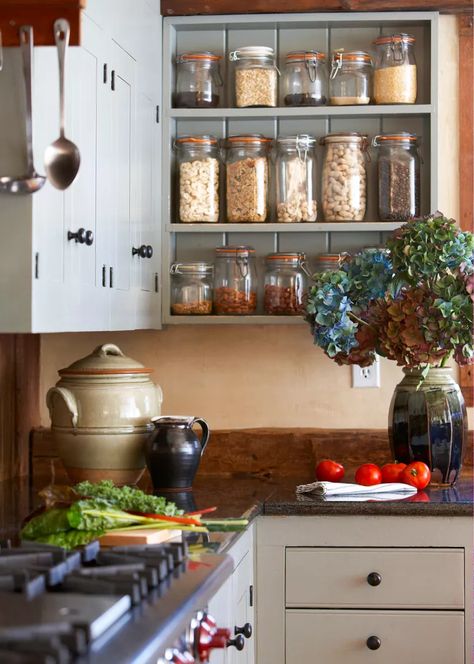 The Italian Grandmother Aesthetic Is the Perfect Elegant-Meets-Rustic Look Rustic Italian Kitchen, Italian Country Kitchen, Rustic Kitchen Cabinet, Glass Upper Cabinets, Italian Apartment, Grandmother Aesthetic, Yellow Cabinets, Italian Home Decor, Kitchen Cabinet Ideas