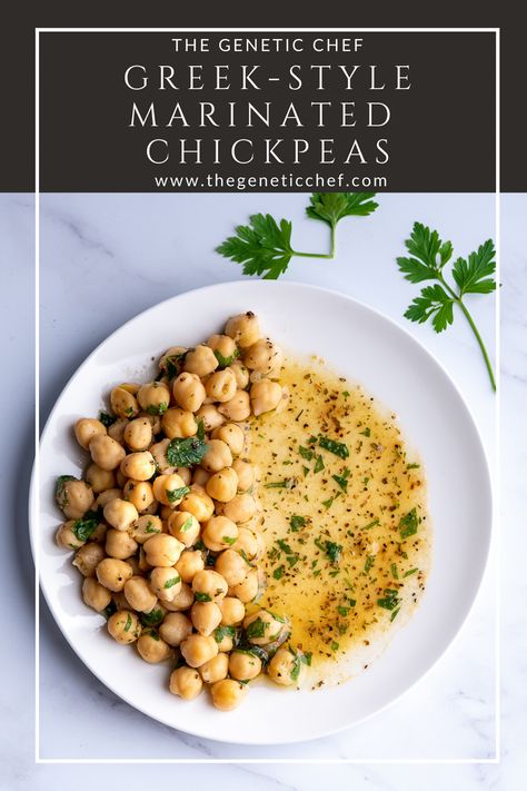 Greek-Style marinated chickpeas are prepared in minutes then left to allow the flavors to marry and form a match made in heaven. Pile it on a cracker, salad, sandwich, or eat as is. You can also blend it for a delicious spread. #chickpeas #salads #sides #Greekchickpeas #whole30recipes | @thegeneticchef Marinated Chickpea Recipes, Greek Chickpeas With Parsley And Cumin, Greek Garbanzo Beans, Marinated Chickpeas Recipe, Marinated Chick Peas Recipe, Marinated Garbanzo Beans, Greek Chickpea Recipes, Trader Joe’s Greek Chickpeas Recipe, Chickpea Seasoning Recipes