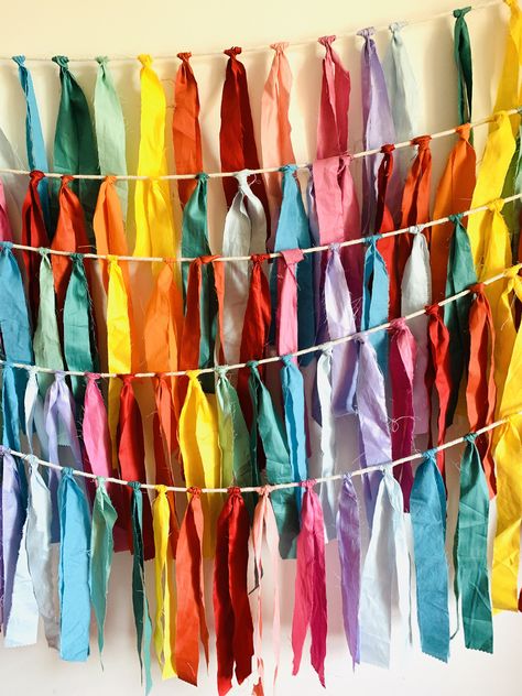 Fabric tassel bunting. Bestseller.  Pretty, 100% environmentally friendly and the cheapest in the market.  Made from recycled materials. Handmade to order. 100%  environmentally friendly. Generous 25 cm drop. Made from cotton fabrics and cotton rope. . 4cm gap between tassels. Washable. Reusable. Easy to store.  Bulk discounts available. Any colour combo available. ( just message me. I love love love a quirky custom order!) Suitable for indoor and outdoor. Perfect for attaching lights for extra Boho Backyard Party Decor, Summer Solstice Decor, Handmade Party Decorations, Summer Solstice Party Decorations, Festival Themed Party Decorations, Boho Outdoor Party, Festival Decorations Outdoor, Whimsical Party Decor, Tassel Garland Decor