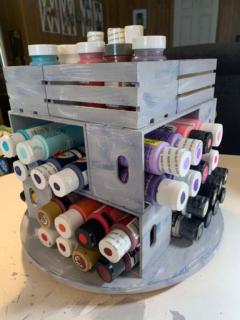 Made a lazy susan, 12 mini wooden crates from the dollar tree and hot glue. Holds up to 96 standard paint bottles. Diy Dollar Store Organization Ideas, Paint Organizer, Dollar Store Organization Ideas, Store Organization Ideas, Craft Paint Storage, Dollar Tree Diy Organization, Crate Crafts, Craft Room Organization Diy, Dollar Store Organization