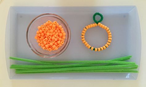 Halloween Practical Life Activity - Threading beads to make a pumpkin bracelet! Montessori October Practical Life, Halloween Themed Kindergarten Activities, Practical Life Fall Activities, Montessori Art Shelf Preschool, Pumpkin Practical Life, Halloween Practical Life, Halloween Montessori Practical Life, Practical Life Ideas Montessori, Practical Life Activities Kindergarten