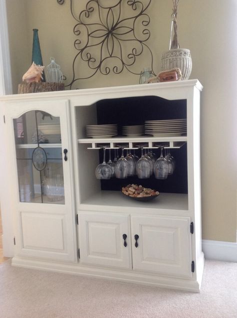 A Wine Bar Lori King at Pinterest has shared a wonderful repurposing idea of an old TV cabinet. Simply paint it and add a wine glass rack to a shelf and turn it into a wine bar. A Kids’ Play Kitchen Debbie Williams at eHow has shared a cute creation made from an upcycled TV Old Tv Cabinet, Vintage Stereo Cabinet, Old Entertainment Centers, Repurposed Dresser, Entertainment Center Makeover, Wooden Tv, Diy Tv Stand, Entertainment Cabinet, Entertainment Center Repurpose