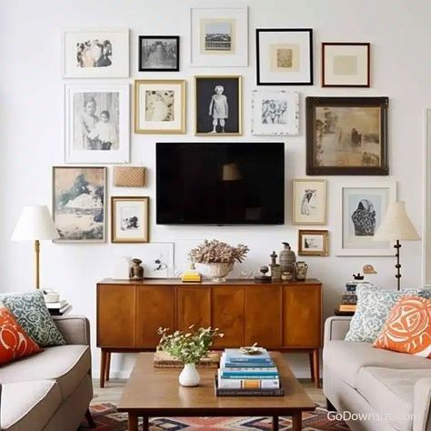 This living room features a focal TV flanked by a curated gallery wall of artworks or photographs, and complemented by a timeless walnut sideboard and strategically placed floor lamps. Tv And Console Table, Cozy Mid Century Modern, Cozy Mid Century Modern Living Room, Tv Wall Decor, Mid Century Modern Living, Mid Century Modern Living Room, Salon Style, Tv Wall, Modern Living