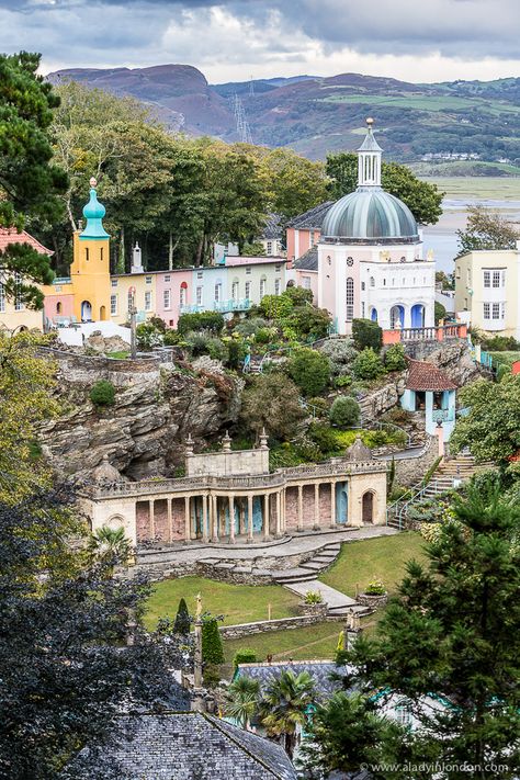 Portmeirion, Wales is just magical with its colorful buildings and eclectic architecture.  #portmeirion #wales #uk #architecture Wales Nature, Portmeirion Wales, Wales Landscape, Eclectic Architecture, Uk Architecture, Powis Castle, Magical Village, Italian Seaside, Welsh Coast